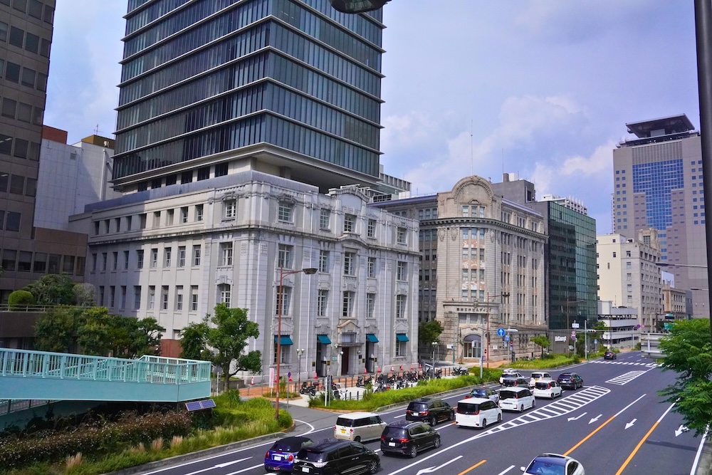 Historic office buildings and modern high-rises along Kaigan-dori in Kobe
