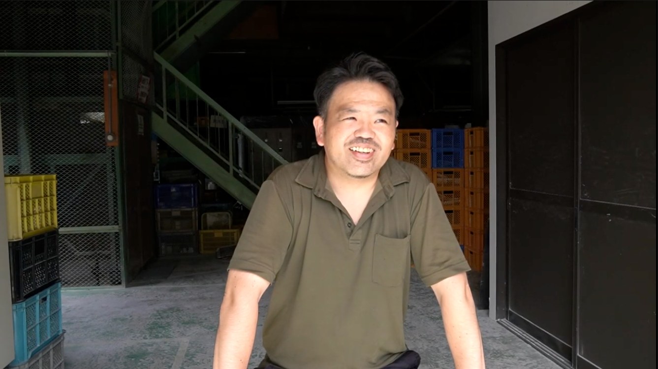Slip caster Kumazawa smiling at the Miyama porcelain factory in Mizunami, Gifu